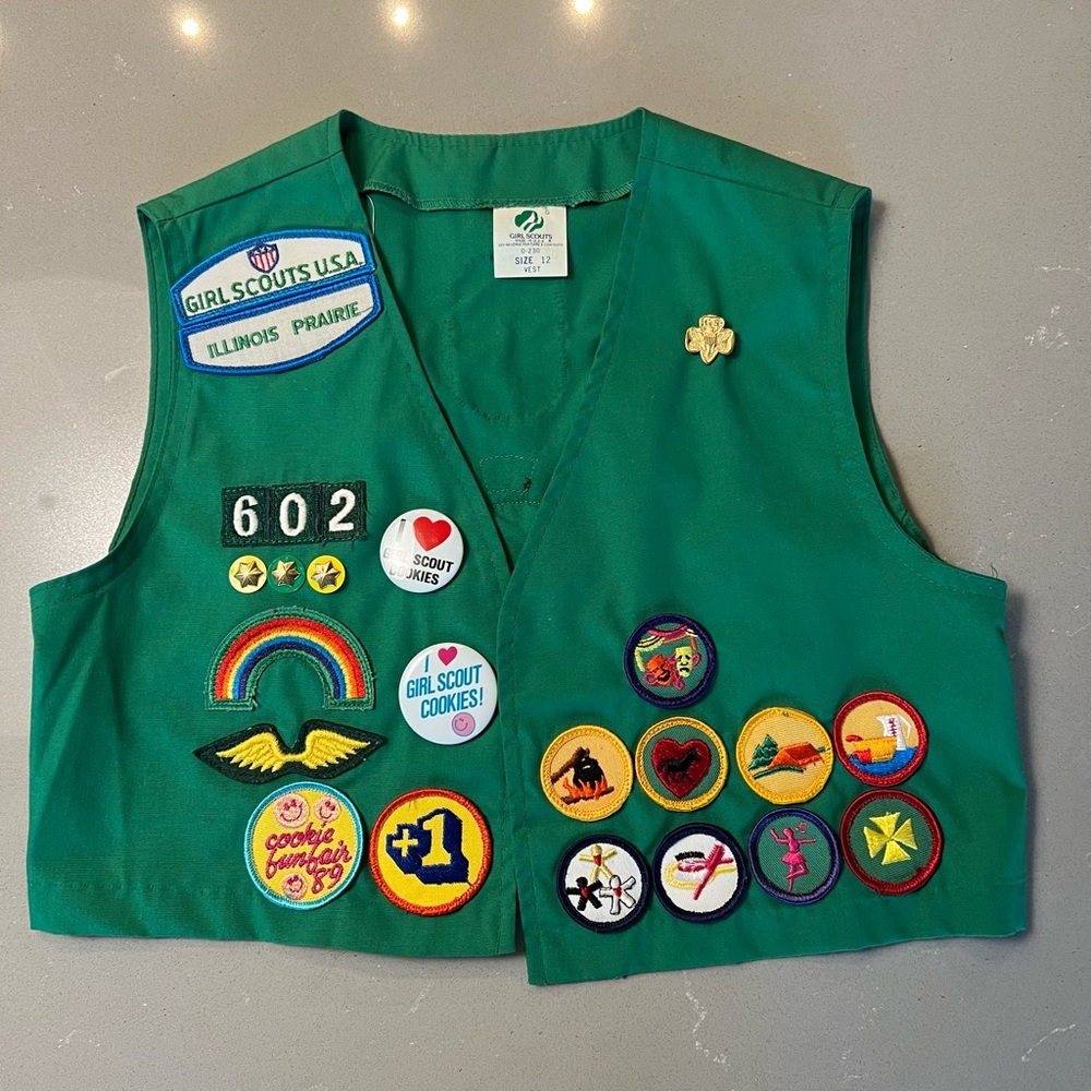 Two vintage Girl Scout vests